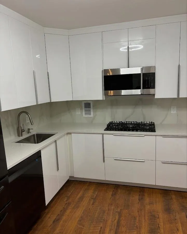 Restored kitchen with white cabinets after water damage in Grambling